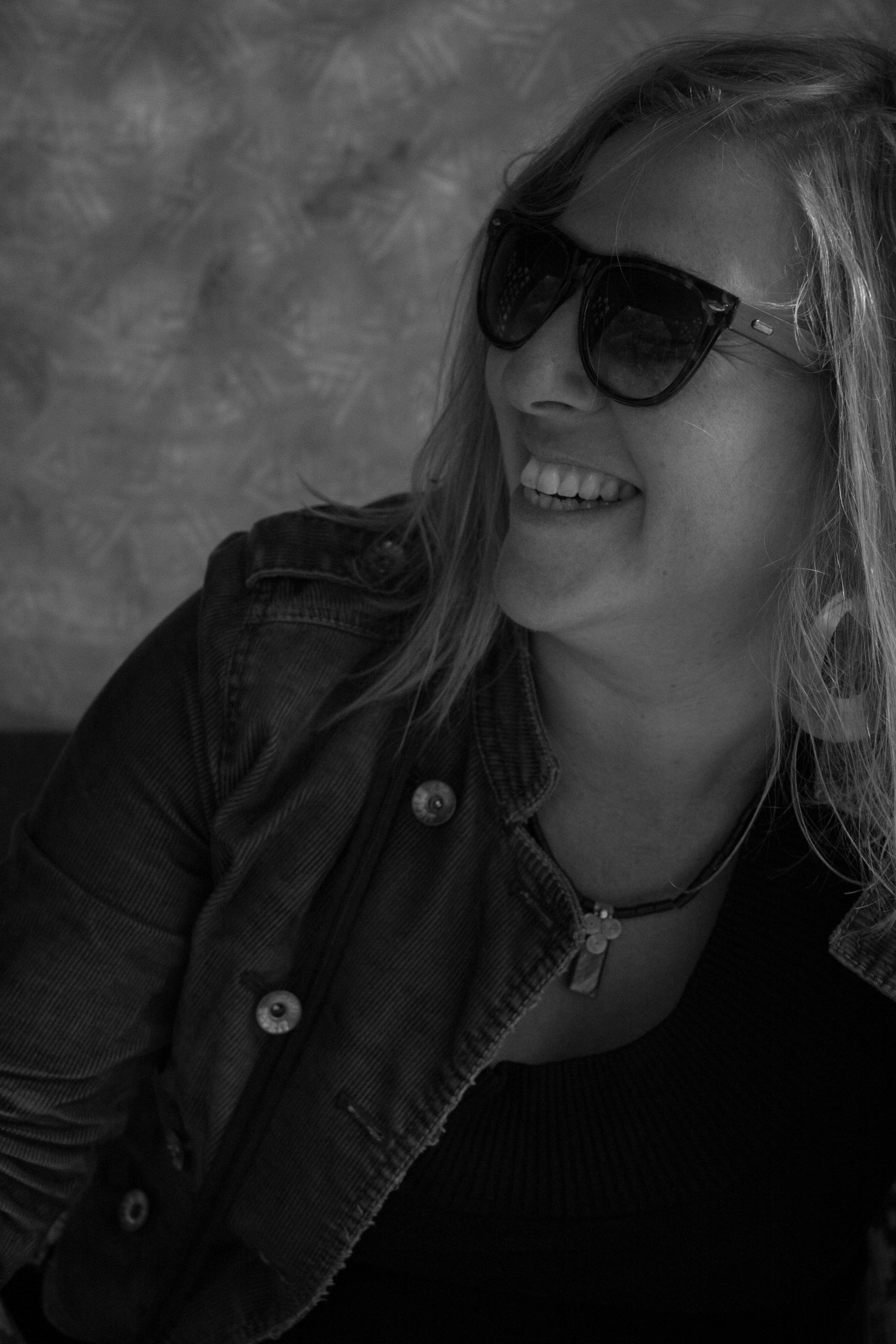 Suzanne Gay in sunglasses, black and white